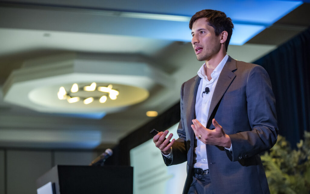 Man speaking at a conference